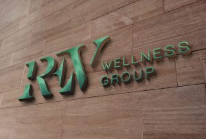 REV Wellness Group Logo Wall Sign Mock-up